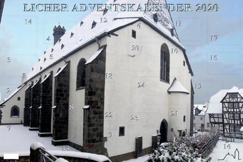 Der neunte Licher Adventskalender mit der Marienstiftskirche im Schnee. Foto: Projektteam Marienstiftsgemeinde Lich 